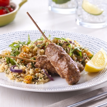 Lamb kebabs with couscous salad and crusty bread